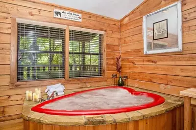heart-shaped jacuzzi tub in cabin rental