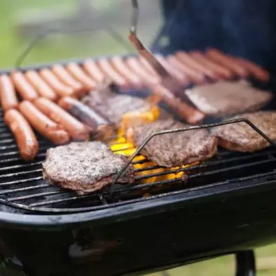 Hot dogs and hamburgers on the grill at our Gatlinburg TN cabins for rent.