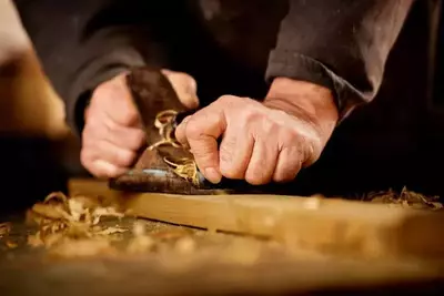 Craftsman working with wood