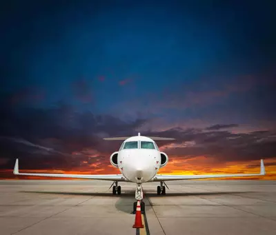 Jet plane at sunset