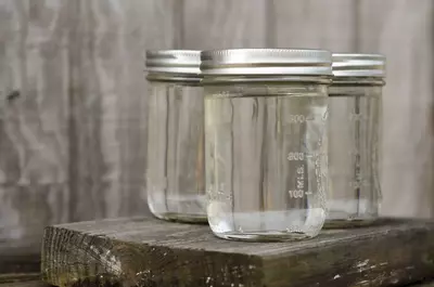 Three jars of clear moonshine