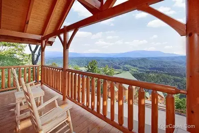 log porch with mountain views