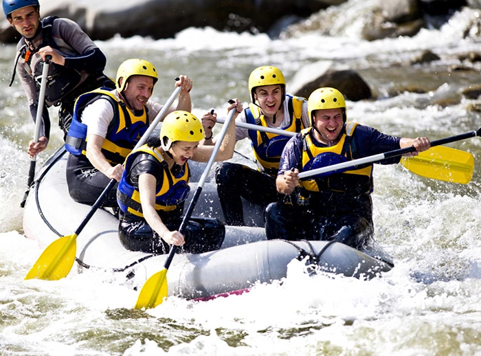 group of friends rafting