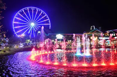 The Fountains and Wheel at night at The Island