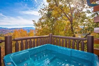 Starry Mountain Moonlite hot tub with autumn mountain view