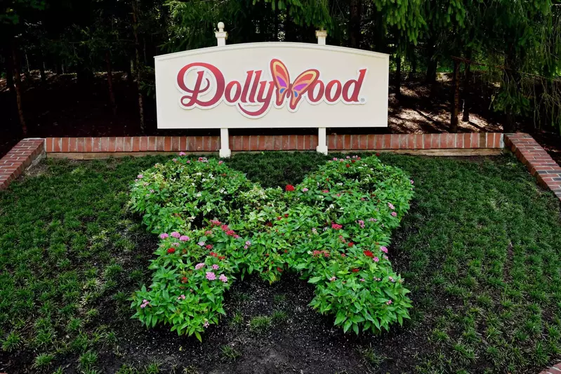 Dollywood sign with butterfly made out of flowers