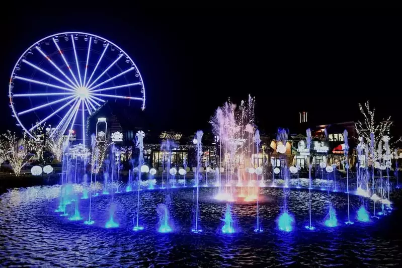 the island in pigeon forge fountain at night