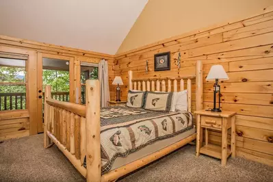 bedroom in pigeon forge cabin