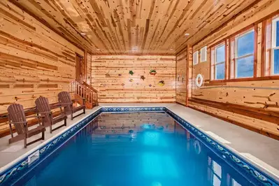 indoor pool in poolside cinema lodge