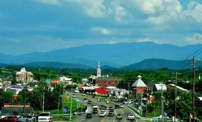The town of Sevierville TN and the Smoky Mountains.