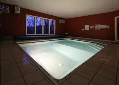 indoor pool in poolin' paradise cabin