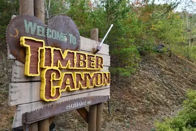 The sign for the Timber Canyon section of Dollywood.