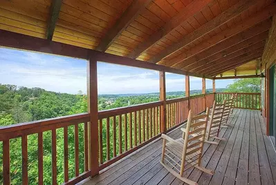 Chairs on the deck of the Pigeon Forge View cabin.