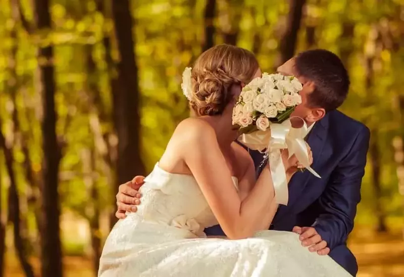 Bride and groom kissing after thier Smoky Mountain wedding.