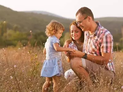 Happy family in the mountains near our 4 bedroom cabins for rent in Gatlinburg TN.