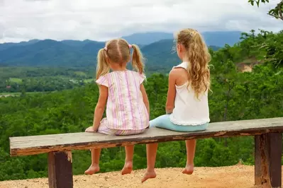 two girls enjoying the scenic view during a Galtinburg family vacation