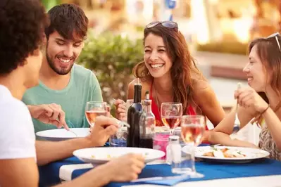 Friends enjoying a meal at a restaurant near our 8 bedroom Gatlinburg cabins.