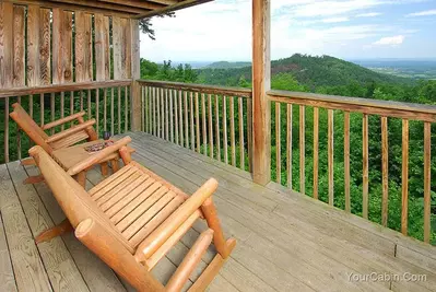 chairs on the deck of a cabin