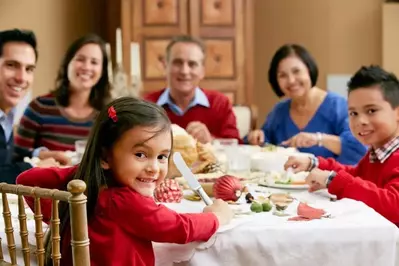 Family eating Christmas dinner