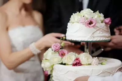 Wedding cake with bride and groom