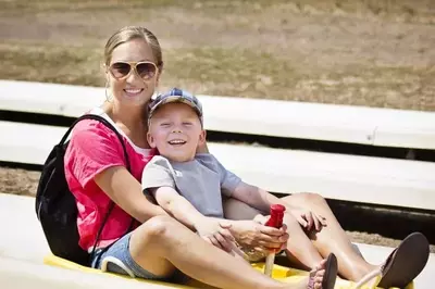 Mom and son on a coaster ride