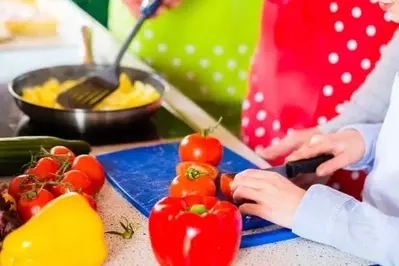 family cooking in a Gatlinburg cabin rental