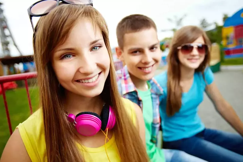 teenagers on vacation at theme park