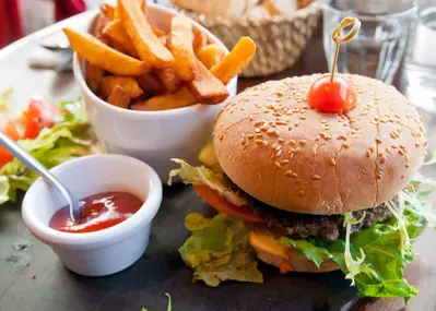 Cheeseburger, fries, and ketchup