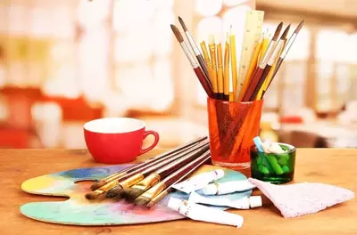 Pencils, brushes, paint, and other arts and crafts tools