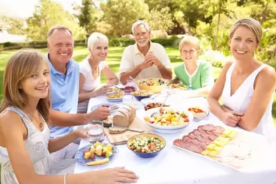 family at picnic table