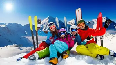Family skiing on mountain
