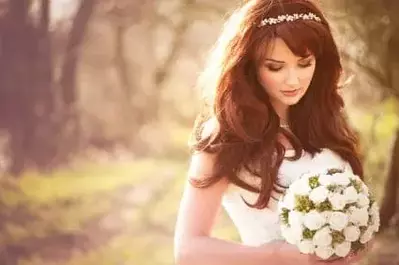 Bride holding wedding flowers