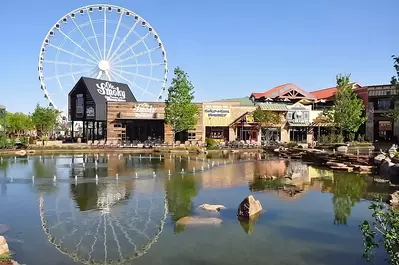Photo of the Ferris wheel and the Ole Smoky Barn at The Island in Pigeon Forge TN.
