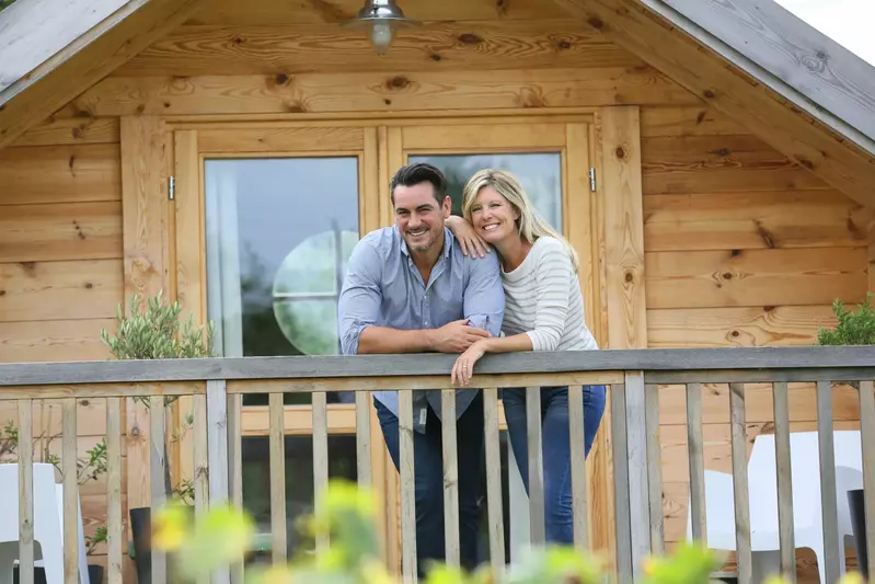 Romantic couple enjoying the deck of their cabin.