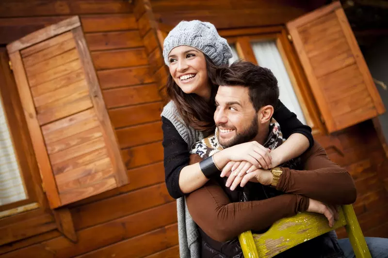 Young couple at a cabin