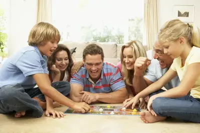 Family playing board game