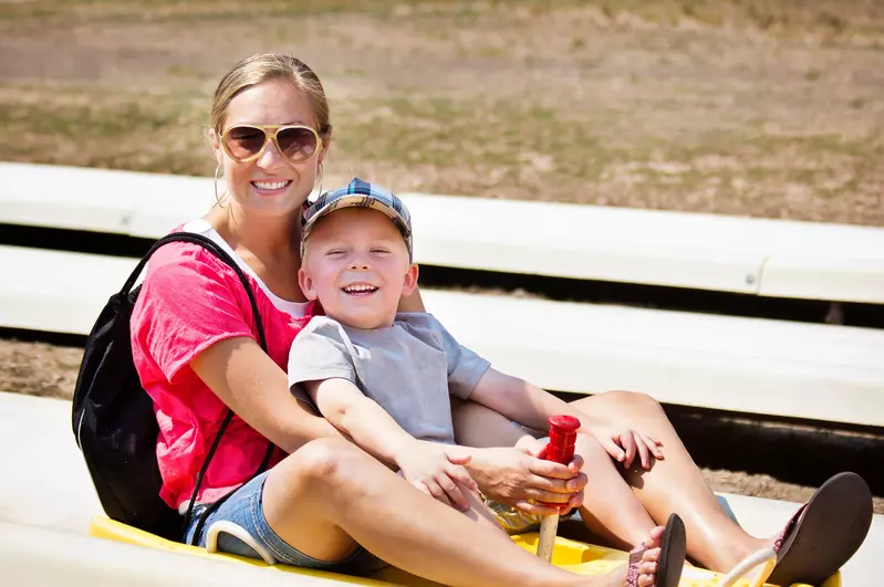 Mom and son on a coaster ride