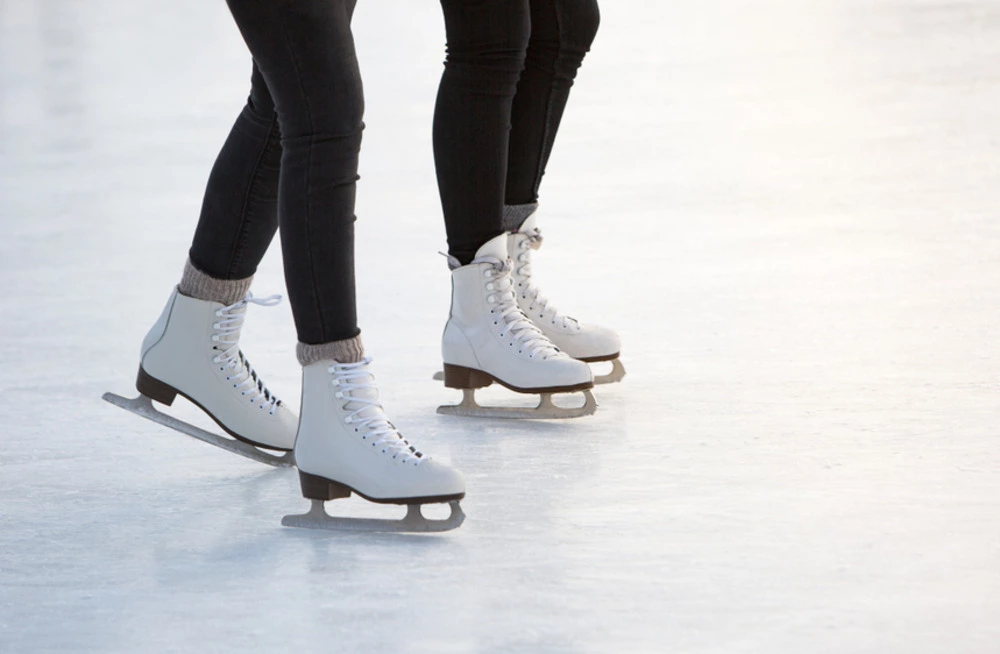 two people ice skating