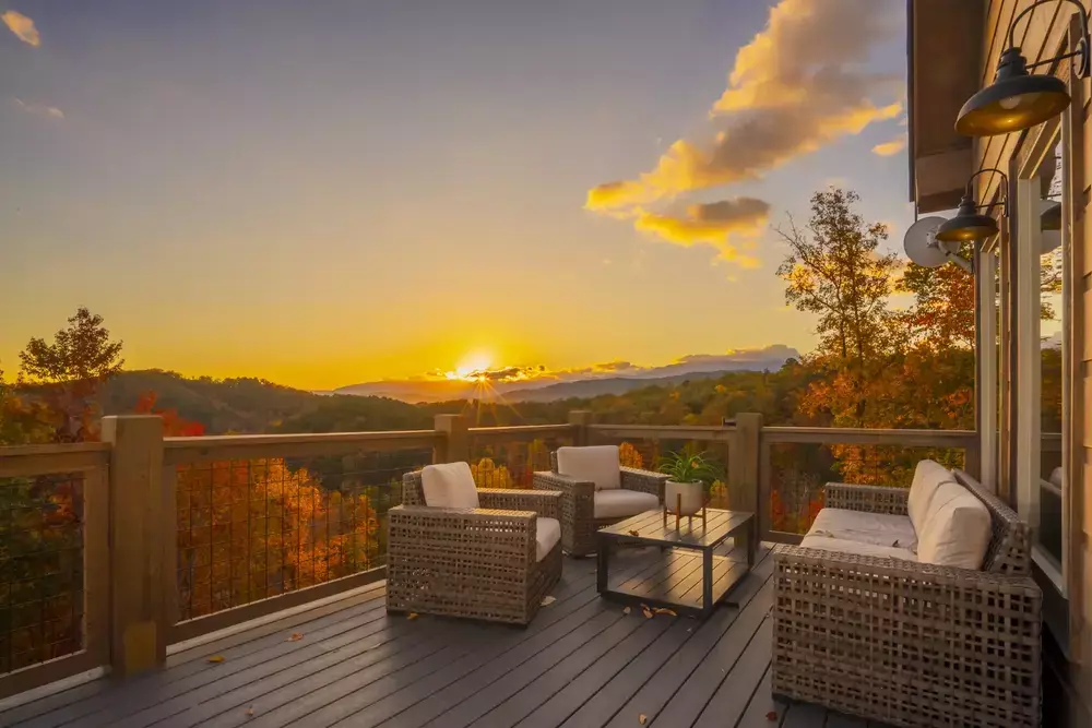view from deck of Western Ridge Lodge in fall at sunset
