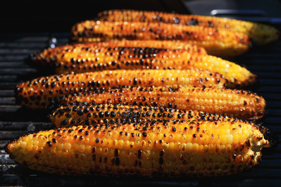 corn cooking on grill